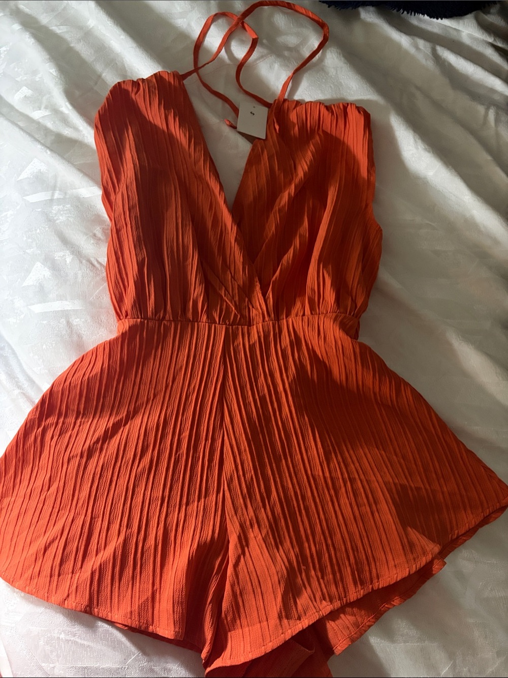 Pleated Orange Plunge Romper with Spaghetti Straps